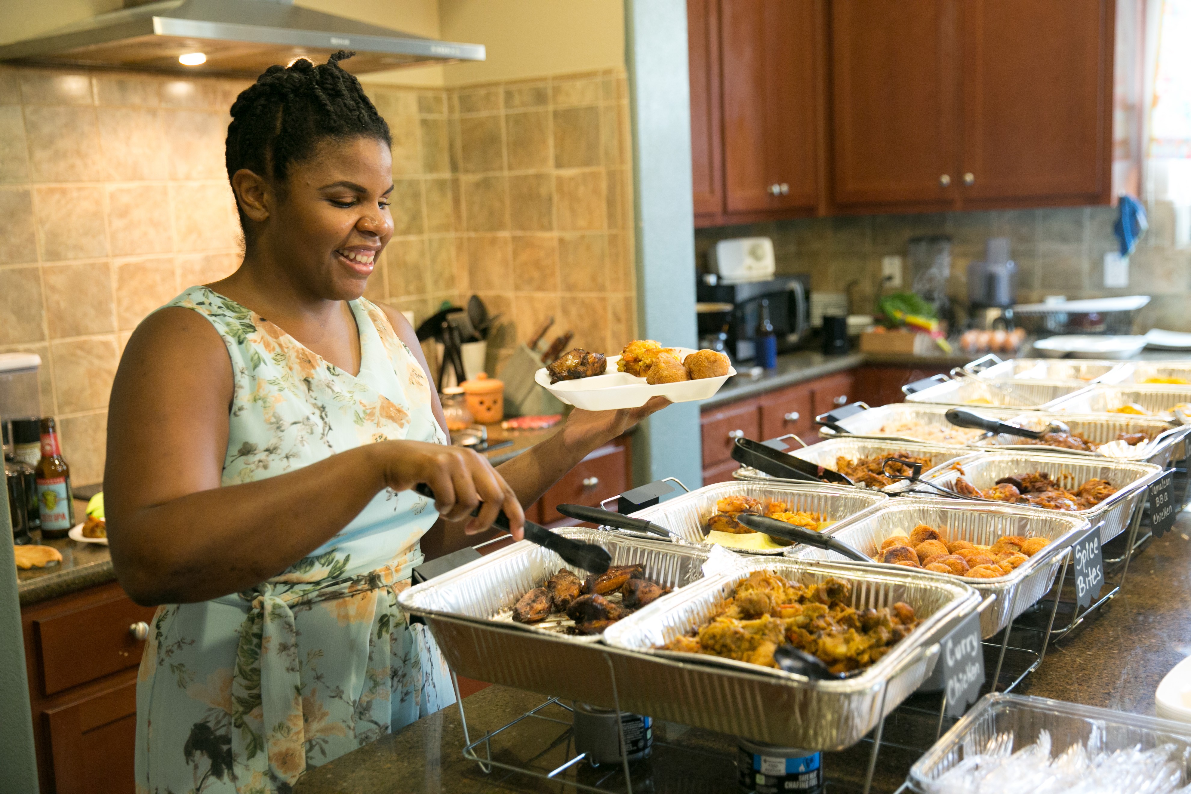 Chantoll Williams of Rasta Mama's Kitchen serves up her delicious Jamaican Family Food